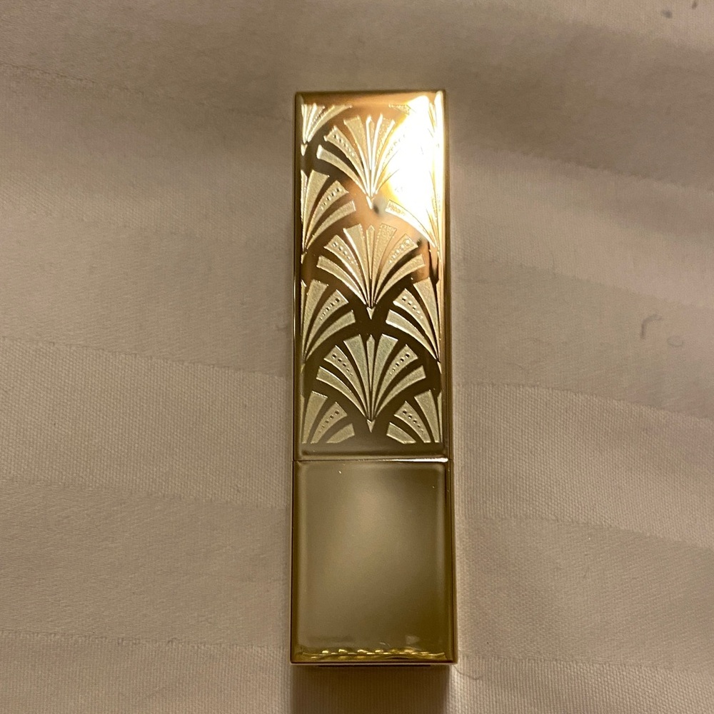 Estée Lauder Pure Color Gold Lipstick Case in color Strictly Confidential.